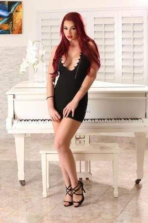 Hot redhead Skyla Novea sucks and tit fucks her man's long cock on fanspics.net