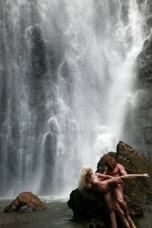 Stunning milf Jesse Jane fucks outdoor in the waterfall on cam on fanspics.net