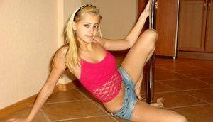 This blonde cover chick have a great wild posing on the floor on fanspics.net