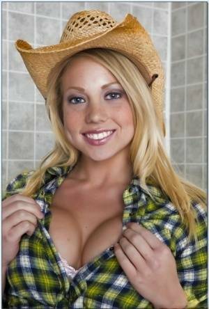 Blond teen babe in a cowboy hat Shawna Lenee goes nude in the shower on fanspics.net