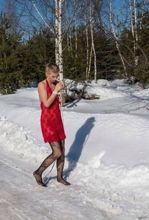 White female is toed up and forced to stand and kneel in snow on fanspics.net