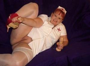 Mature redheaded nurse Valgasmic Exposed exposes herself during dildo play on fanspics.net