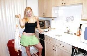 Fuckable blonde amateur Roxy Lovette slowly getting rid of her clothes on fanspics.net