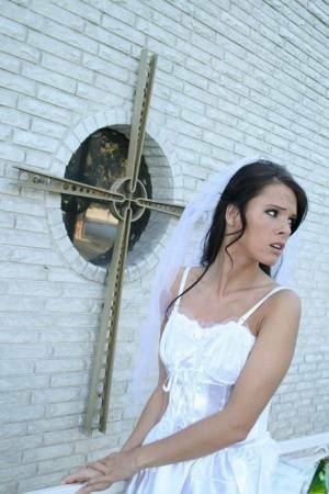MILF babe in bride's dress Jennifer Dark spreading pussy on fanspics.net