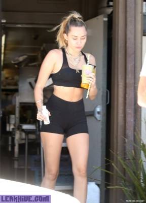  Miley Cyrus Caught In Sport Top And Tight Shorts on fanspics.net