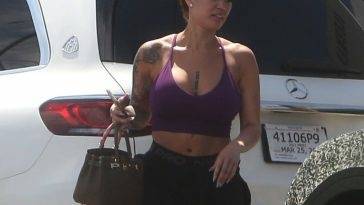 Telli Swift Shows Off Her Sexy Body in a Purple Top and Black Shorts in LA on fanspics.net