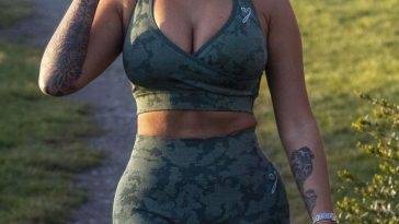 Nikita Jasmine Shows Off Her Ample Cleavage in a Camouflage Exercise Outfit on fanspics.net