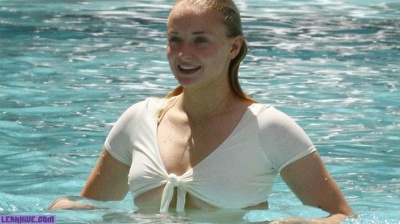 Sophie Turner caught in a bikini and wet flannel on fanspics.net