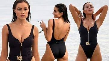 Olivia Culpo Looks Stunning in a Black Swimsuit on the Beach in Miami on fanspics.net