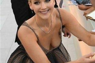 Jennifer Lawrence Bends Down To Show Her Fans Her Boobs on fanspics.net