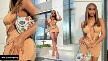 Normani Showcases Her Sexy Tits & Legs as She Poses in a Skimpy Dress on fanspics.net