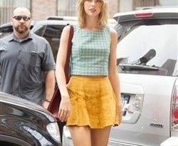 Taylor Swift Traipsing Around NYC In A Mini Skirt on fanspics.net