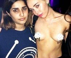 Miley Cyrus Topless With Pasties On At A Rave on fanspics.net