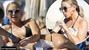 Kate Hudson Stuns in a Black Bikini on the Beach in Miami on fanspics.net