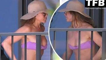 Jennifer Aniston Enjoys Some Downtime on Her Lanai Between Filming in Hawaii on fanspics.net