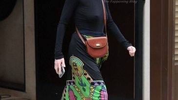 Milla Jovovich Shows Off Her Tits in Paris on fanspics.net