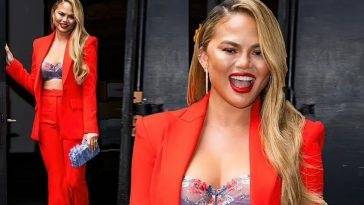 Chrissy Teigen Looks Hot in Red as she Heads to The Wendy Williams Show in NYC on fanspics.net