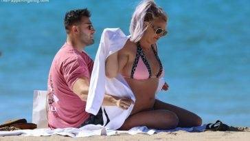 Britney Spears is Seen Wearing a Pink and Black Bikini While on Vacation with Her Boyfriend on fanspics.net