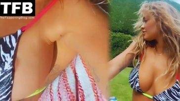 Rita Ora Flashes Her Areola in a Tiny Bikini (18 Nude & Sexy Pics + Videos) on fanspics.net