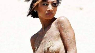 Actress Bai Ling Flashes her Nipples on the Beach in Hawaii on fanspics.net