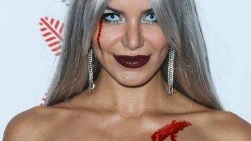 Madison Grace Poses on the Red Carpet at the CARN*EVIL Halloween Party in Bel Air on fanspics.net