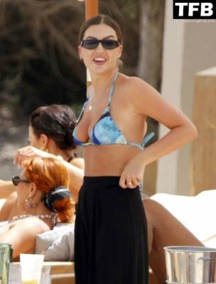 Emma Milton Shows Off Her Luscious Figure at the Beach in Ibiza on fanspics.net