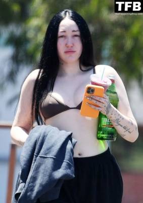 Noah Cyrus Slips Into a Bikini Top Cooling Off From the Sweltering Heat with Her Boyfriend in LA on fanspics.net