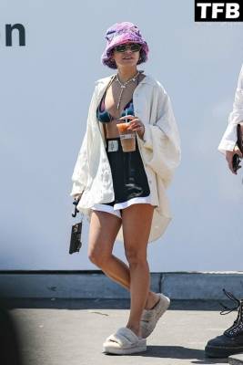 Vanessa Hudgens Grabs an Iced Coffee Wearing a Bikini Top on fanspics.net