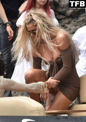 Khloe Kardashian Displays Her Tits and Panties in Portofino on fanspics.net