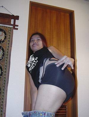 Asian slut with redhead Ning is presenting her tight pussy on fanspics.net