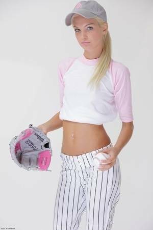 Baseball cutie Francesca loses her uniform to expose her skinny teen body on fanspics.net