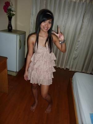 Sweet asian teen babe stripping and getting her hairy poon drilled on fanspics.net