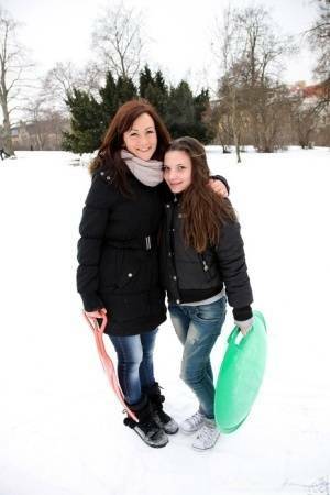 Young lesbians lick and finger twats after a day of sledding in the snow on fanspics.net