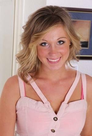 Smiling coed Ashley Jones gets naked for the very first time on fanspics.net