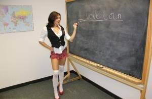 Naughty schoolgirl Cherry Poppins seduces a fellow student in slut wear on fanspics.net