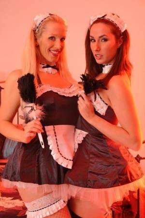 British maids Paige Turnah & Rebecca More have lesbian sex on a bed - Britain on fanspics.net