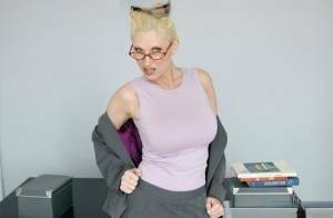 Mature teacher in glasses Devon Lee exposing her smashing goodies on fanspics.net