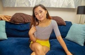 Petite Asian teen Elle Voneva engages in POV sex with a white cock on fanspics.net