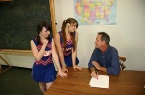 2 cheerleaders jerk off their geography teacher on top of his desk on fanspics.net