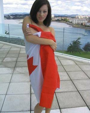 Teen amateur Kate wraps her naked body up in a Canadian flag on fanspics.net