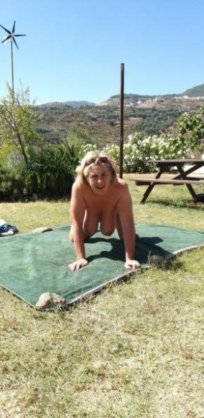 Mature amateur sports a creampie after sex atop a picnic table on fanspics.net