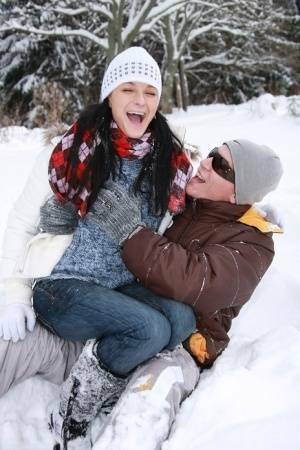 Teen girl opens her mouth for a cumshot after fucking in the snow on fanspics.net