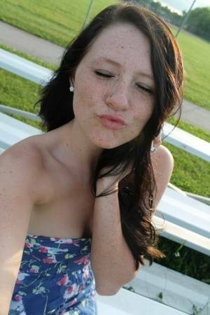 Teen solo girl Freckles 18 exposes her upskirt panties at a ball diamond on fanspics.net