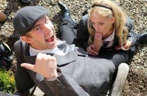 Blonde schoolgirl Loulou licks and sucks a huge dick while outdoors on fanspics.net