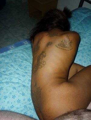 Tattooed Thai girl Nit getting banged bareback on bed by sex tourist - Thailand on fanspics.net
