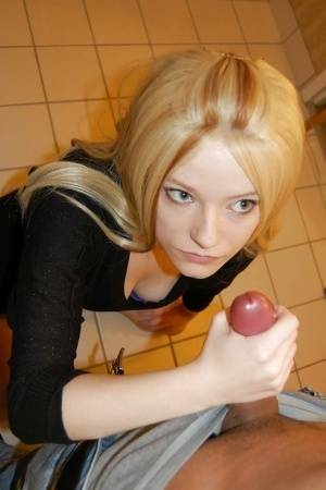 Adorable teen blonde gives a handjob and gets a facial cumshot on fanspics.net