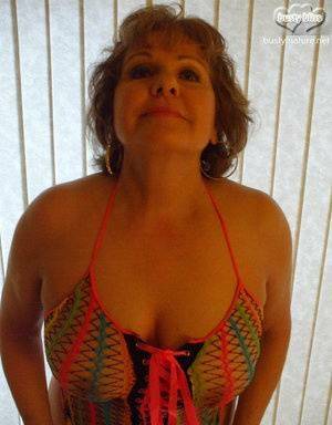 Mature woman Busty Bliss wears see thru attire during POV action on fanspics.net