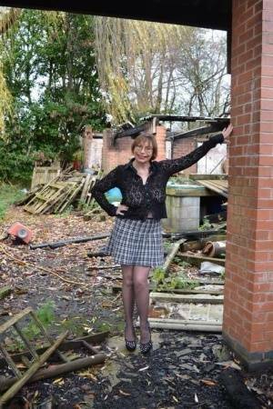 Amateur chick Barby Slut strips to her heels on a demolition site on fanspics.net