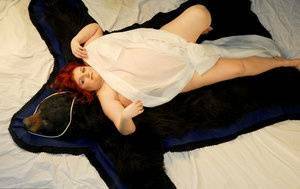 Fat redhead Black Widow AK models totally naked on a bearskin rug on fanspics.net